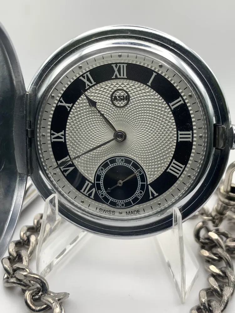 White Dahlia. All Swiss pocket watch. Beautiful NOS ETA/Unitas hammertone 6498 hand wound movement. Guilloche dial. Vintage 47mm case with perlage.