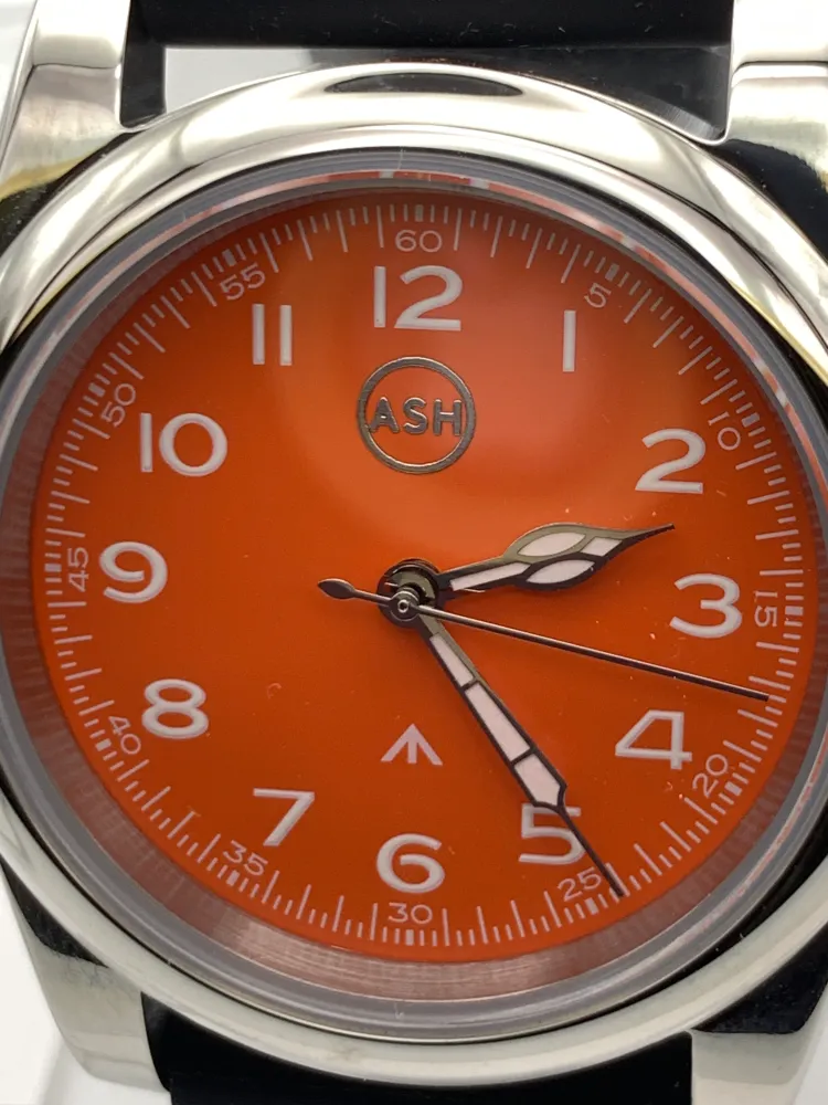 Blood Orange. 39mm stainless steel field watch. Sapphire crystal. NH38 automatic.
