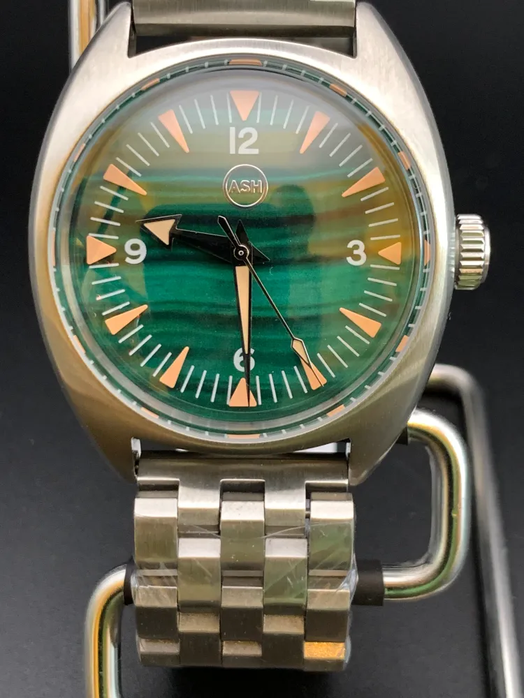 Alpha. 39mm stainless steel case. Domed sapphire crystal. NH38 automatic.