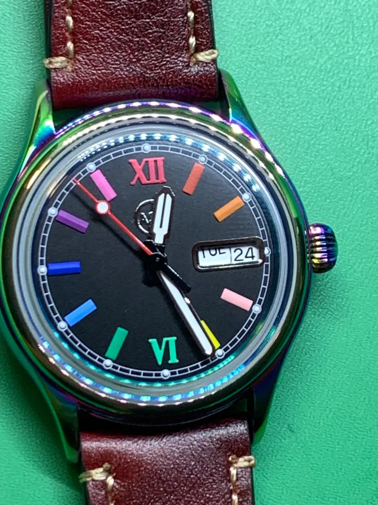 Living Color. 38mm thermally colored stainless steel case and case back. Double dome K-1 mineral crystal. Seiko NH36.