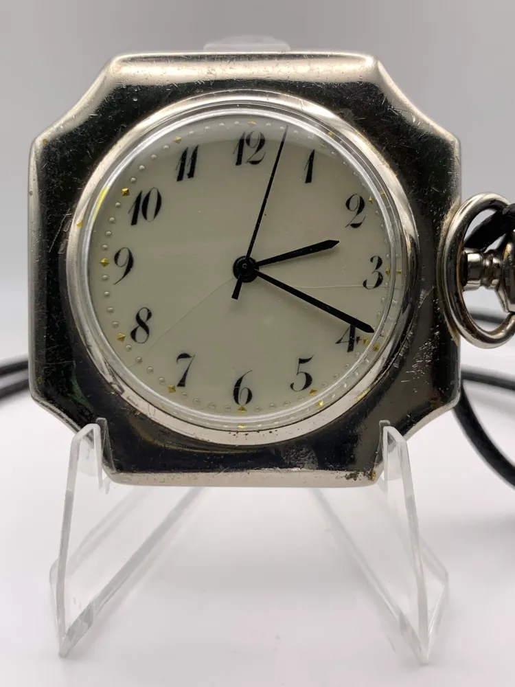 Palimpsest.  40 x 40mm plated brass case. Vintage pendant watch conversion. Domed acrylic crystal. Original enamel dial. Miyota 2036.